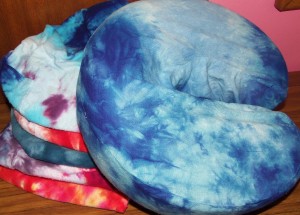 Hand-dyed covers for massage table face cradle cushions